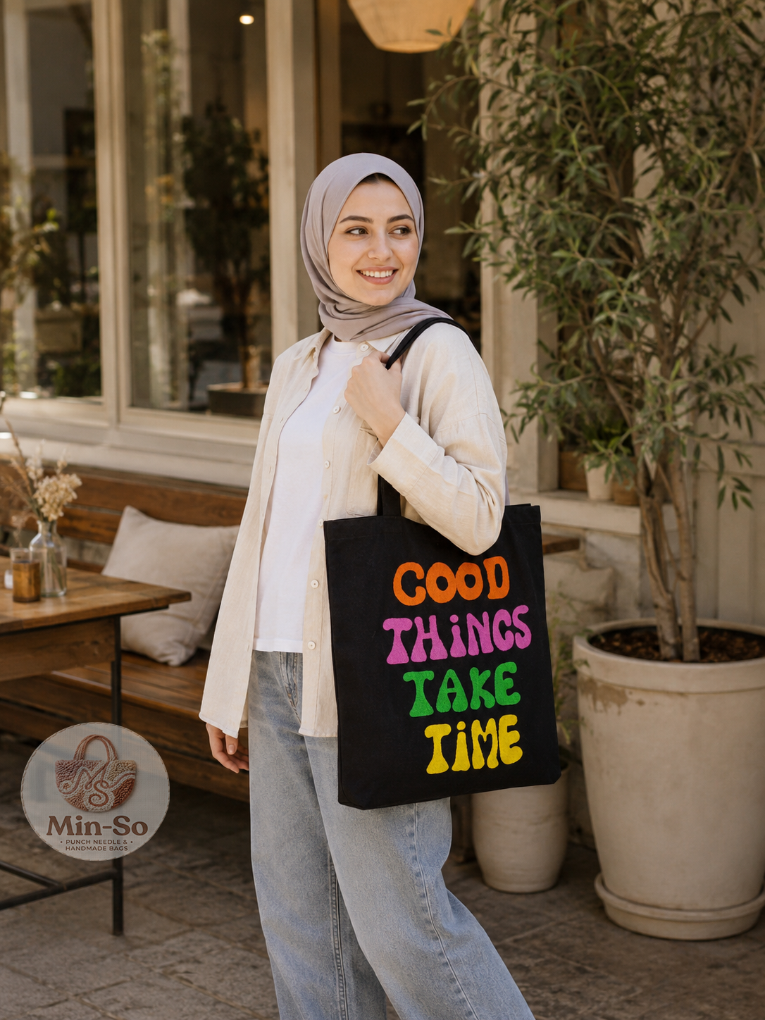 Min-So black handmade tote with a colourful Good Things Take Time design