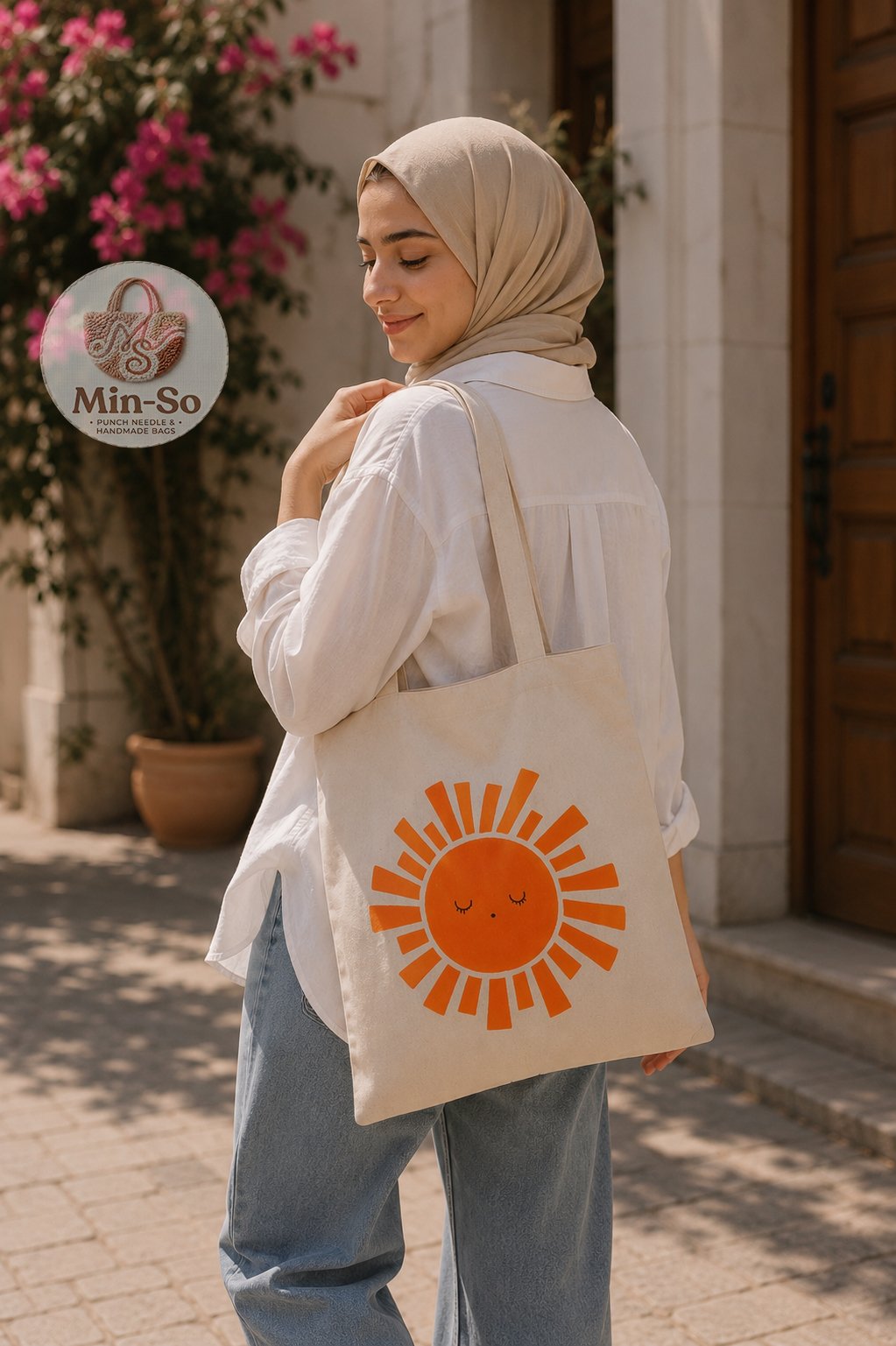 Min-So handmade canvas tote with a warm orange sun design